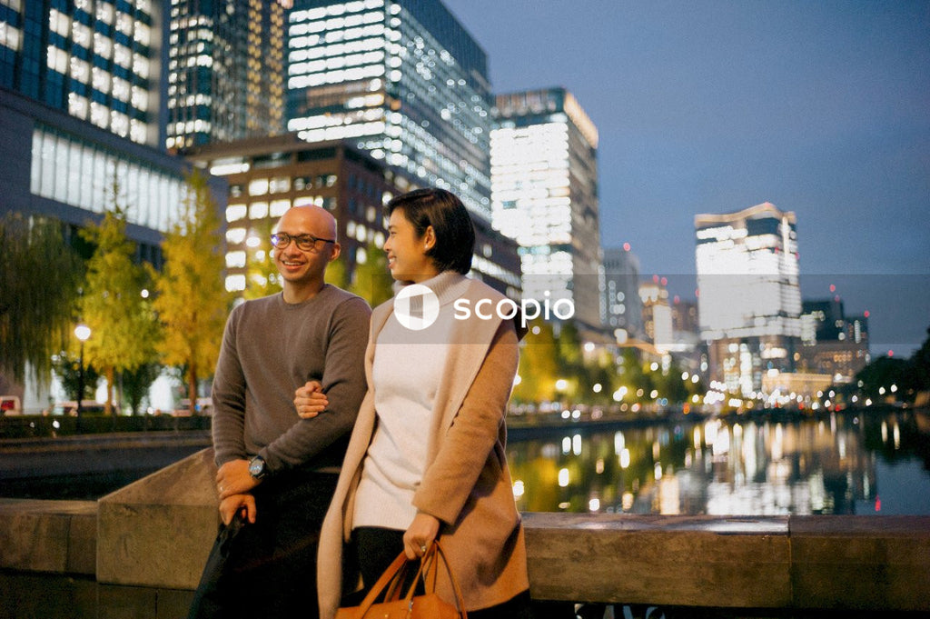 Man and woman standing beside each other outdoor in the city