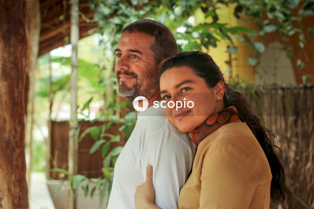 Woman hugging man