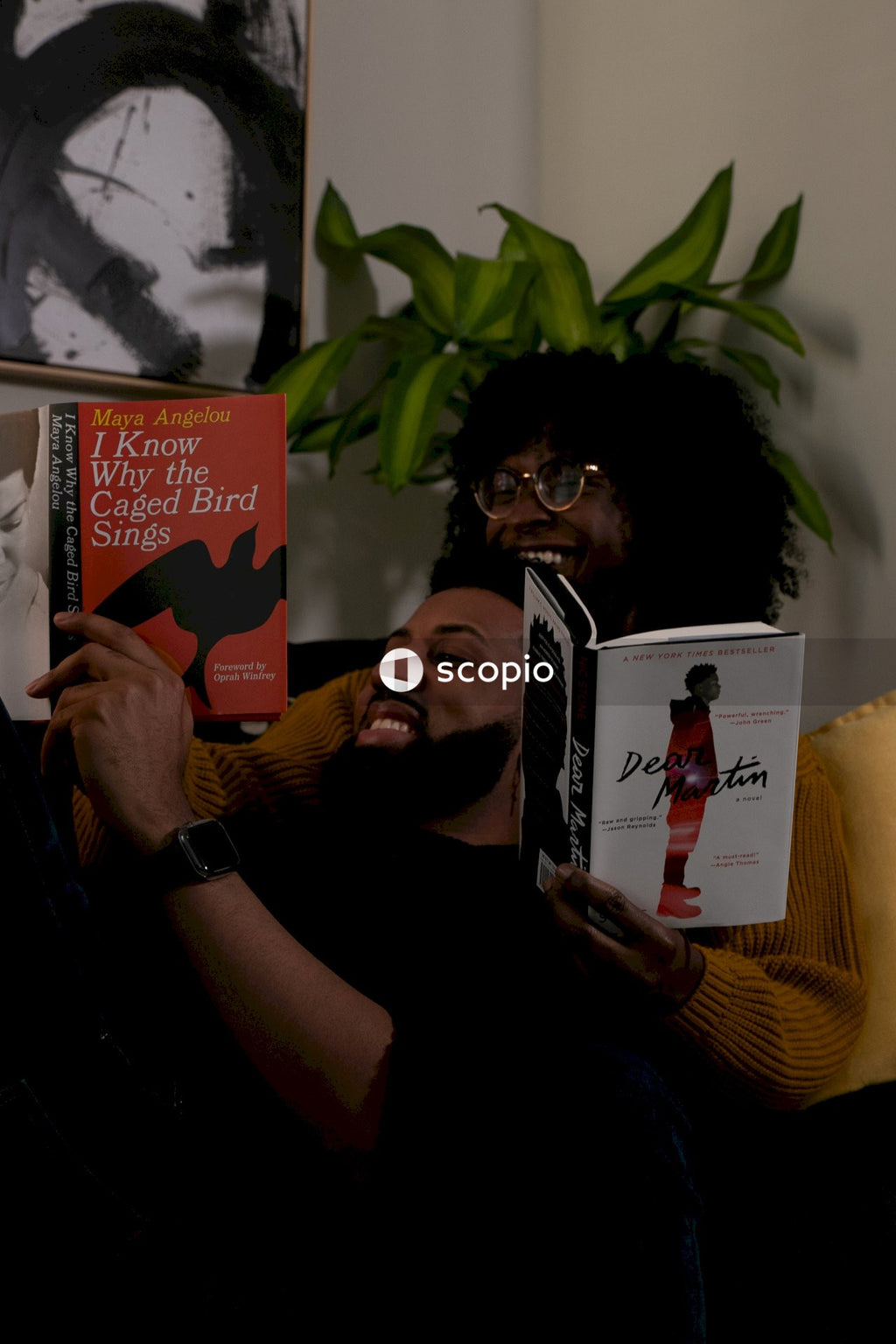 Two people reading books