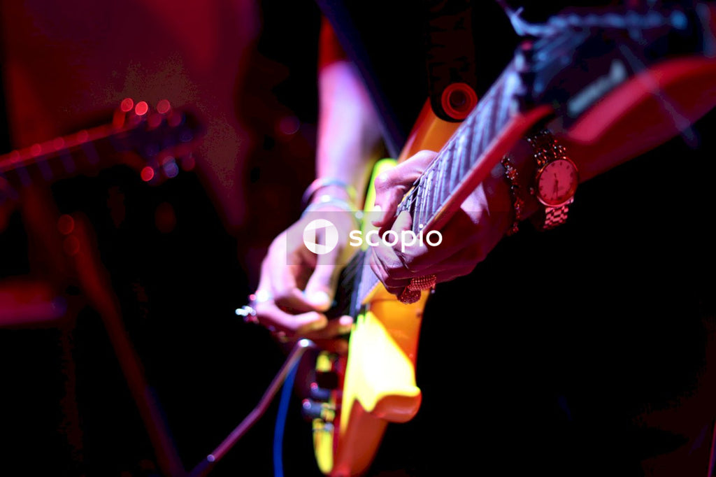 Man playing guitar on stage