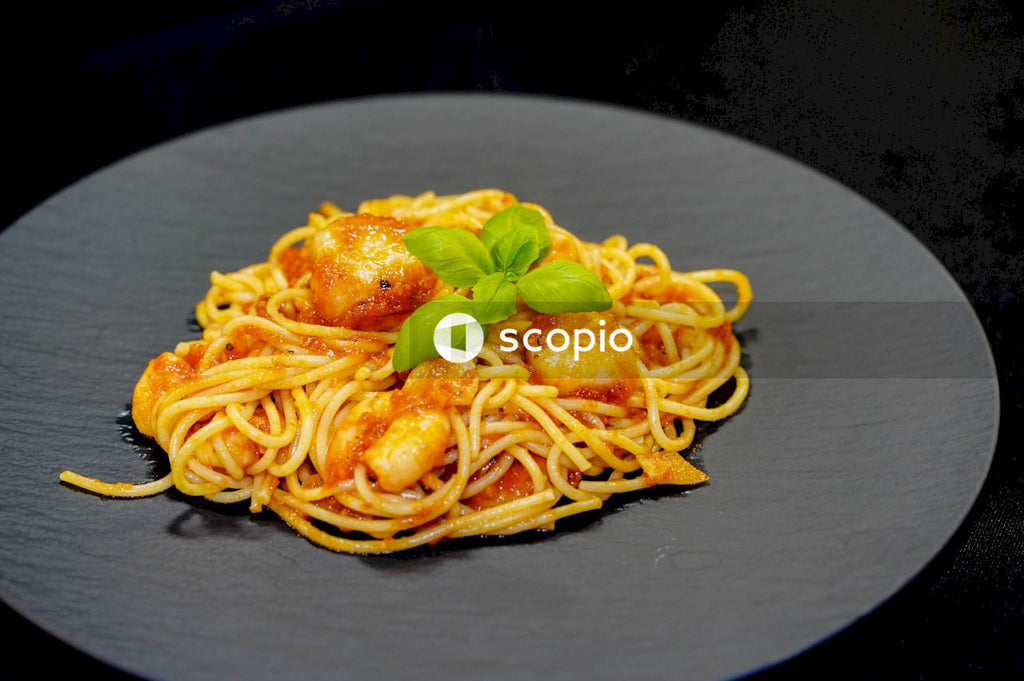 Pasta dish on white ceramic plate