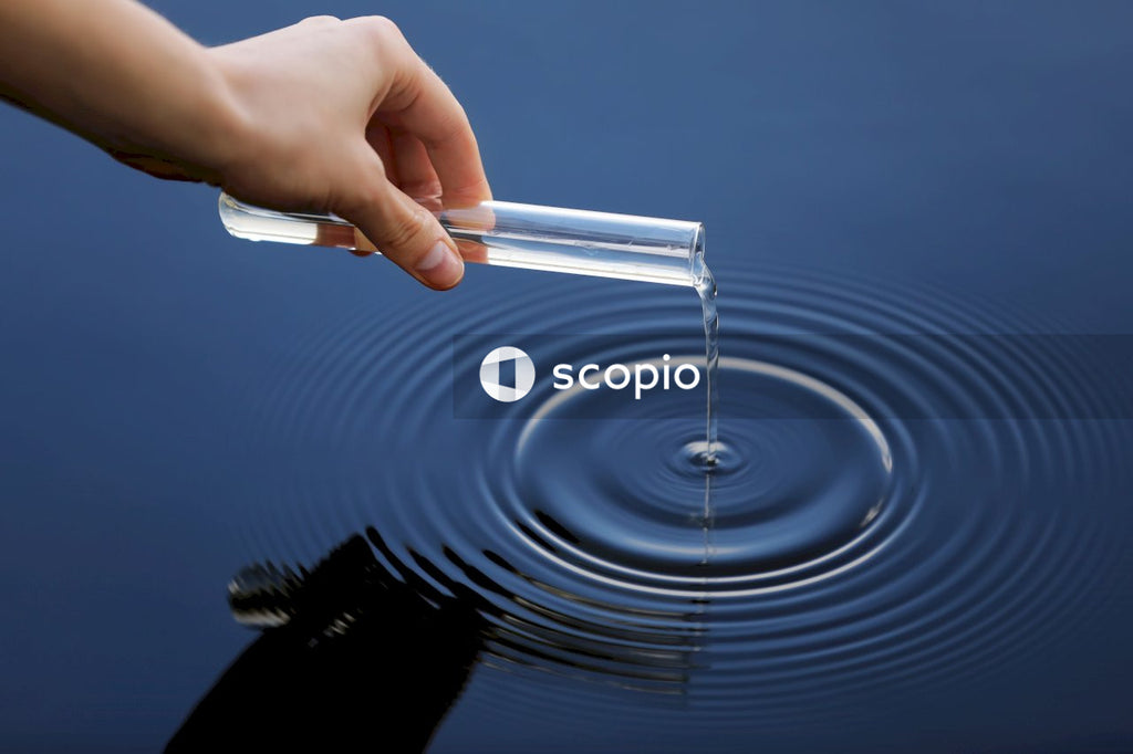 Person holding clear plastic tube