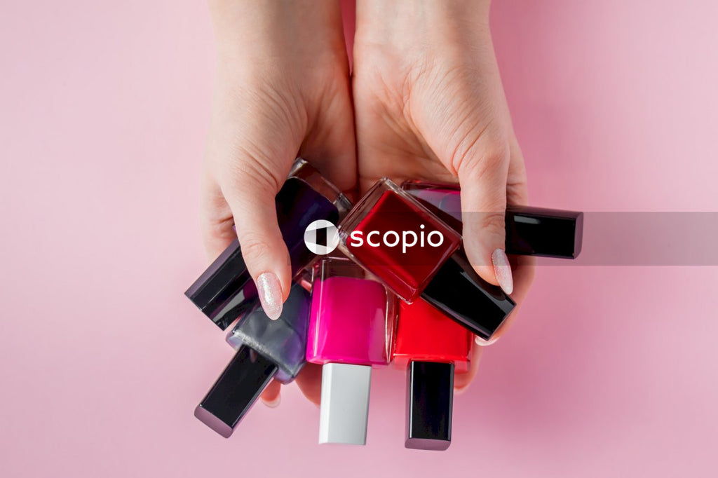Person holding red and black plastic tool