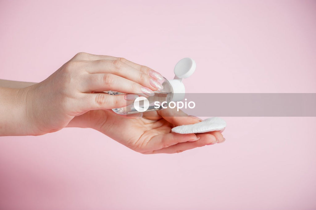 Person holding white round ornament