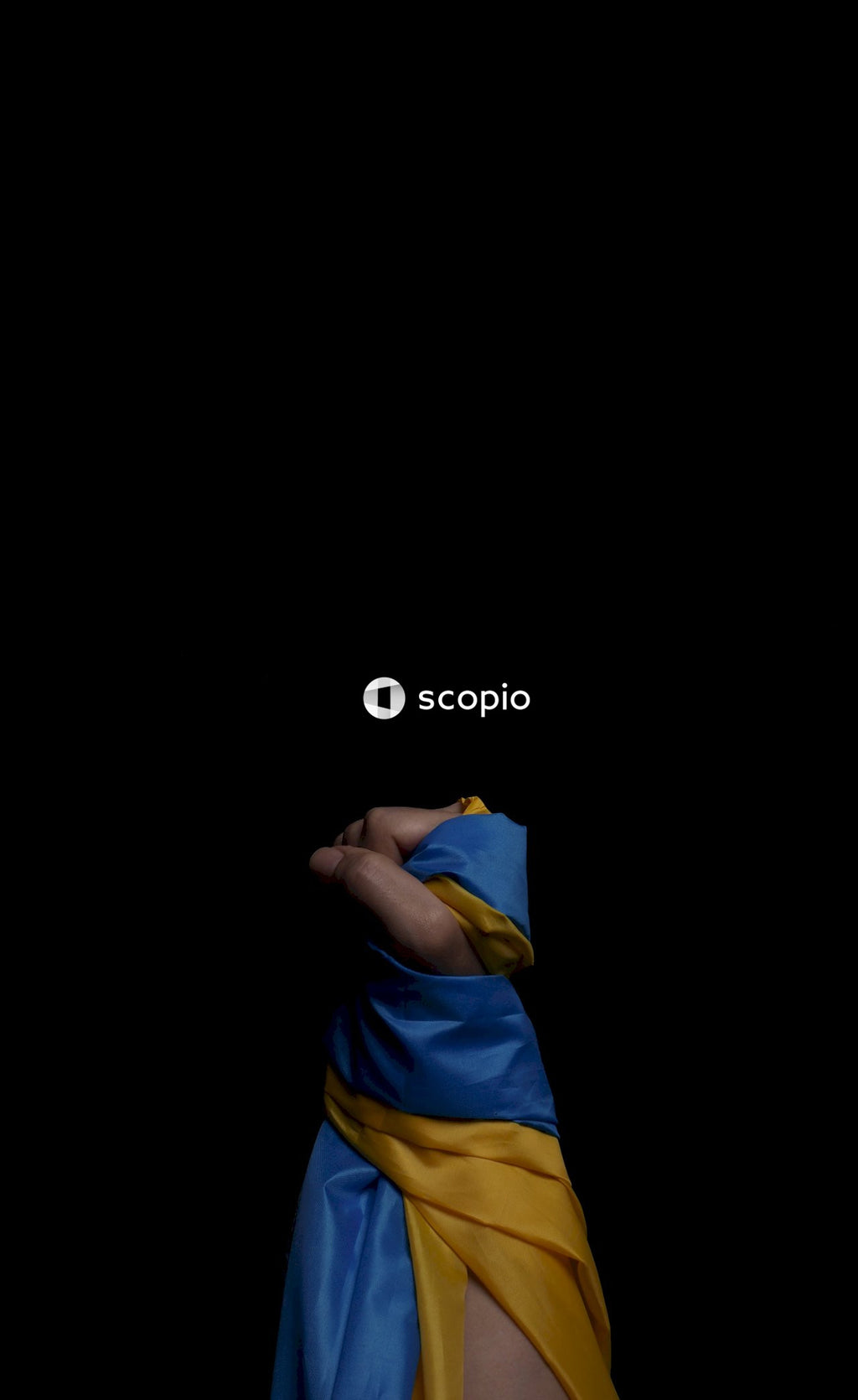 Person in blue yellow and white shirt