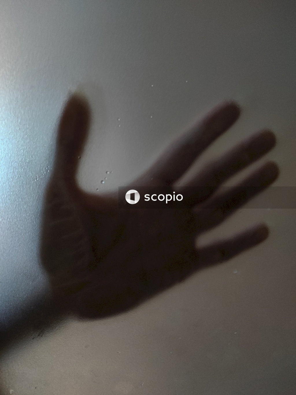 Persons left hand on door
