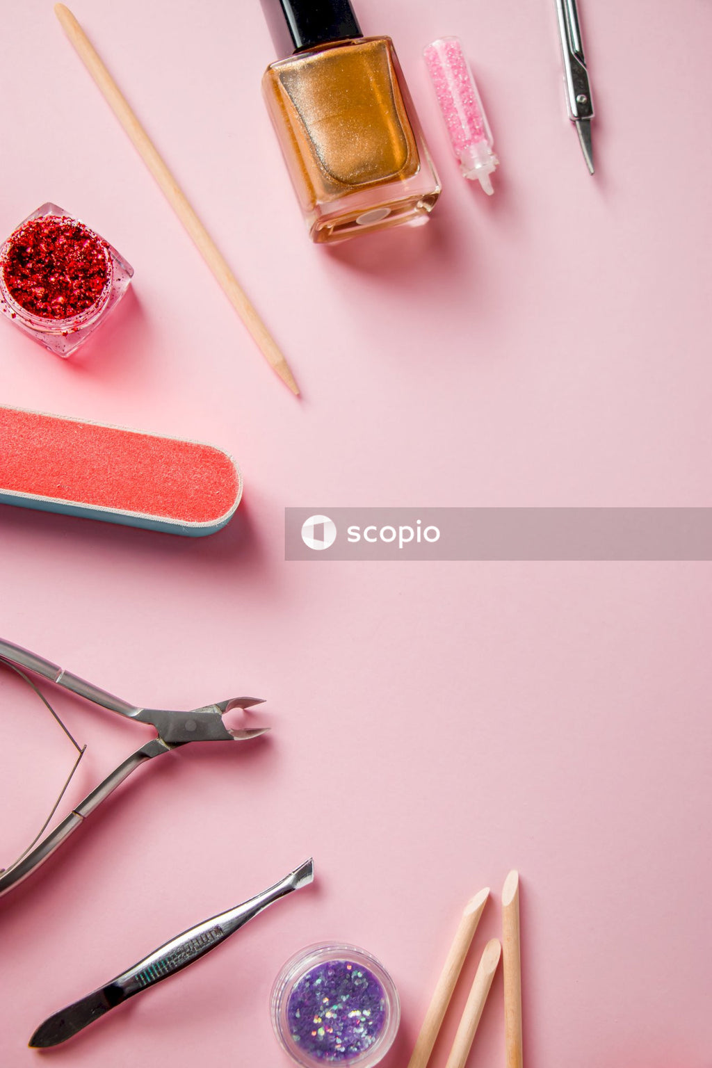 Pink and white iphone case beside silver fork and bread knife