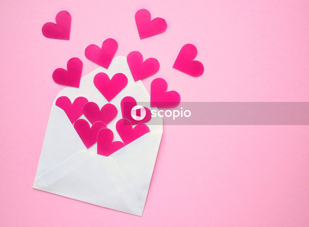 Pink hearts on white paper