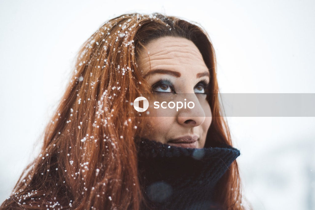 Portrait of woman looking up