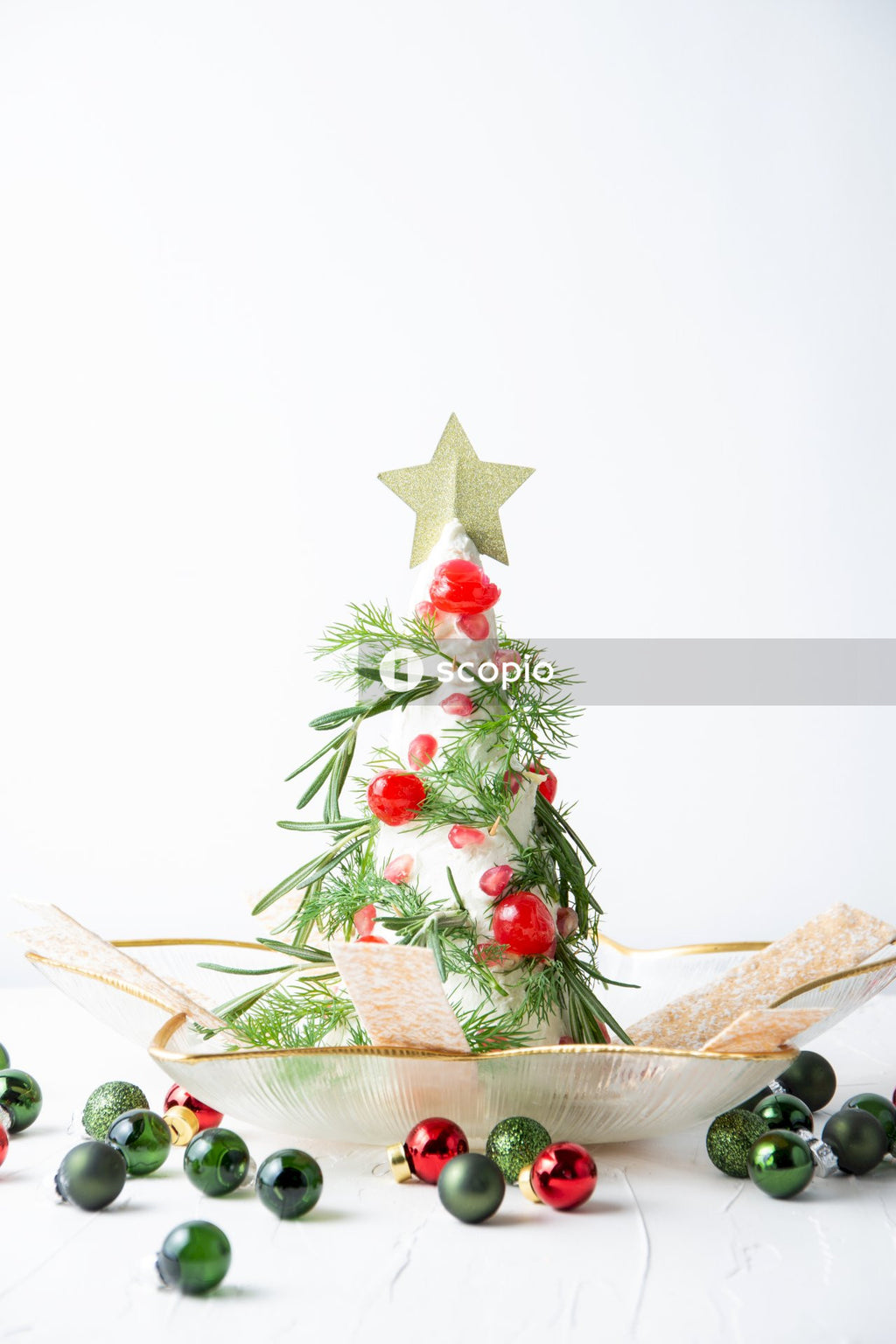 Red and white christmas tree with red and white star and star decors