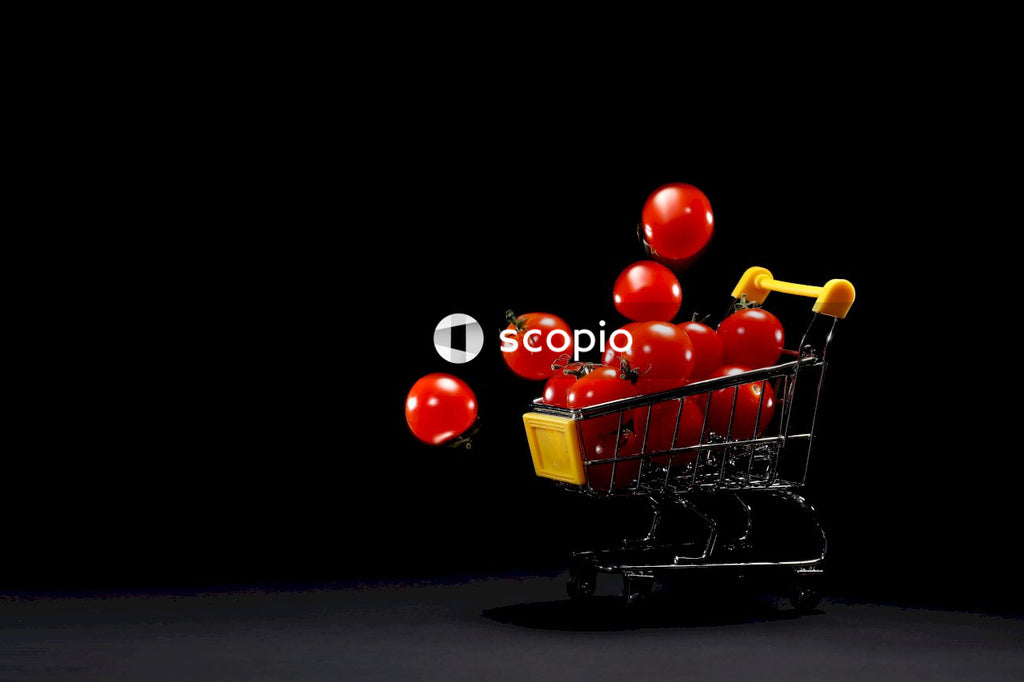 Red tomato on shopping cart
