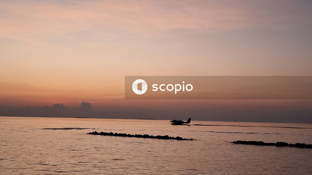 Silhouette of boat on sea during sunset