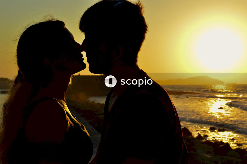 Silhouette of couple kissing during sunset