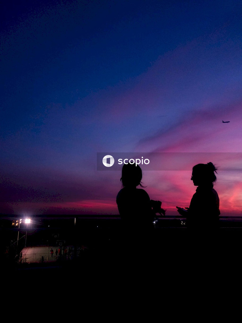 Silhouette of couple standing during sunset