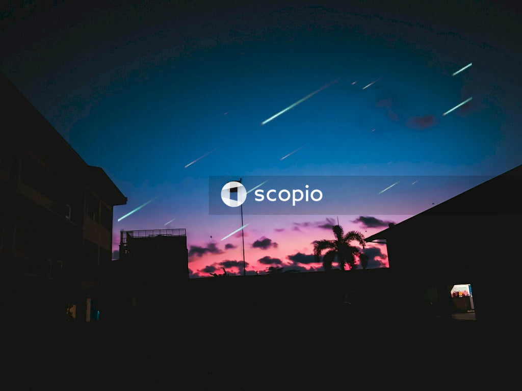 Silhouette of people standing on the street during night time