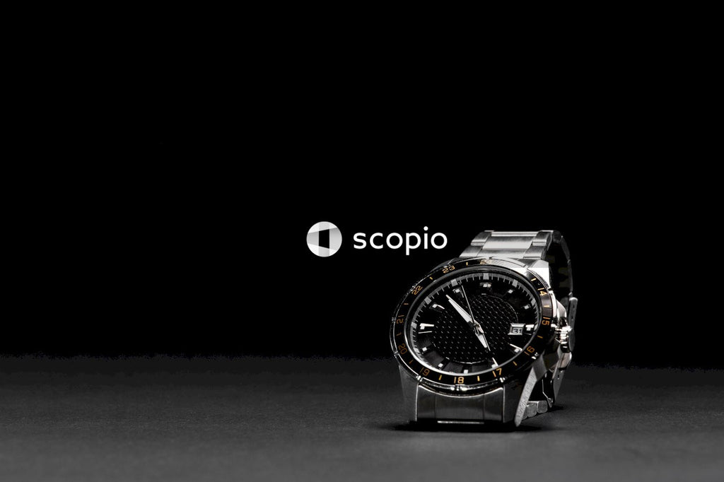 Silver and black analog watch