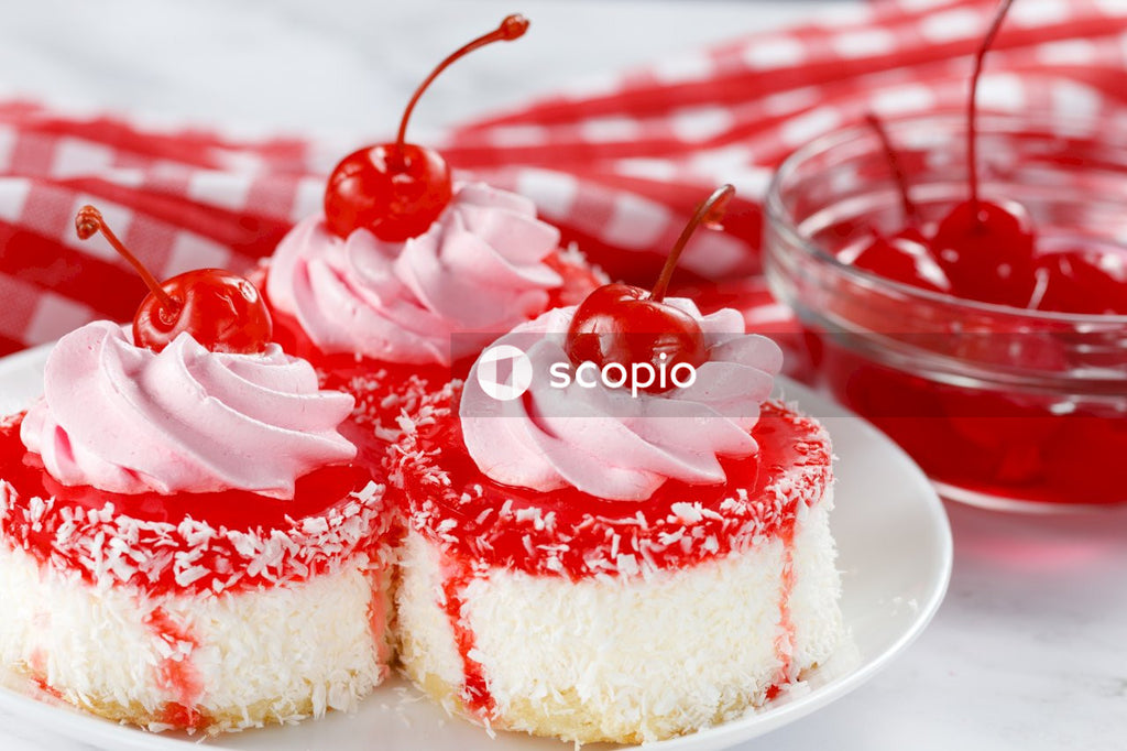 Sliced cake with strawberry on top