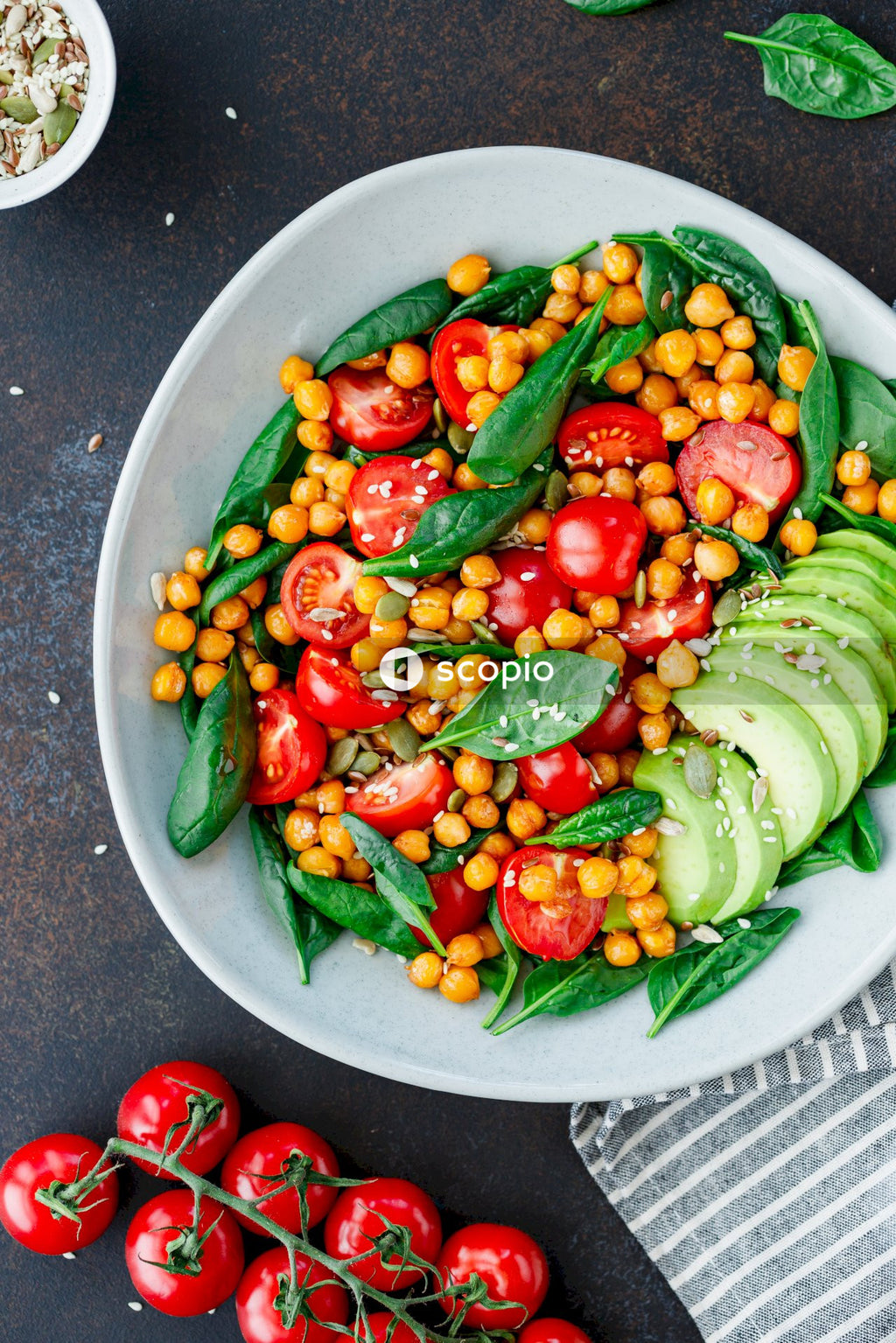 Sliced cucumber and tomato on white ceramic plate