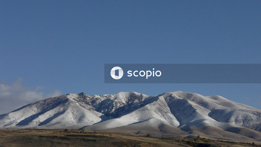 Snow covered mountain under blue sky