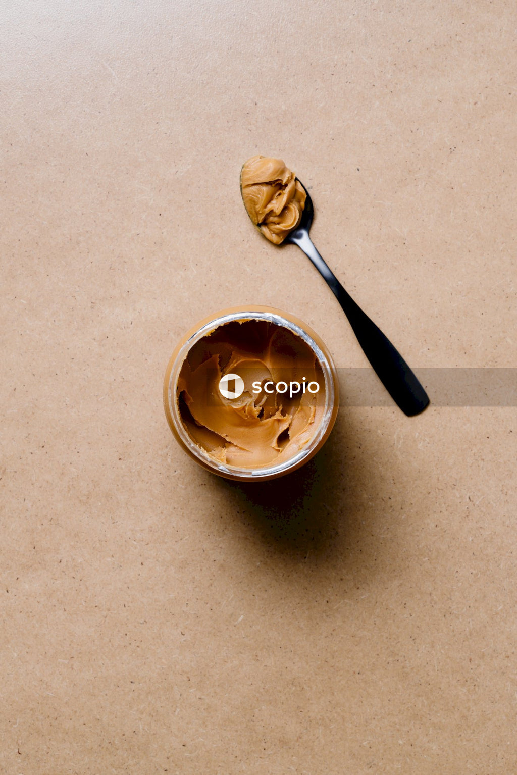 Stainless steel spoon on white ceramic bowl