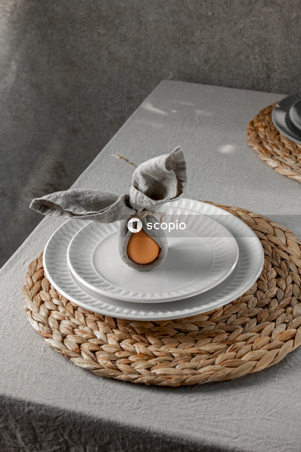 Stainless steel spoon on white ceramic plate