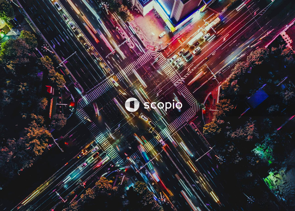 Time lapse overhead photography of city lights during night time car traffic