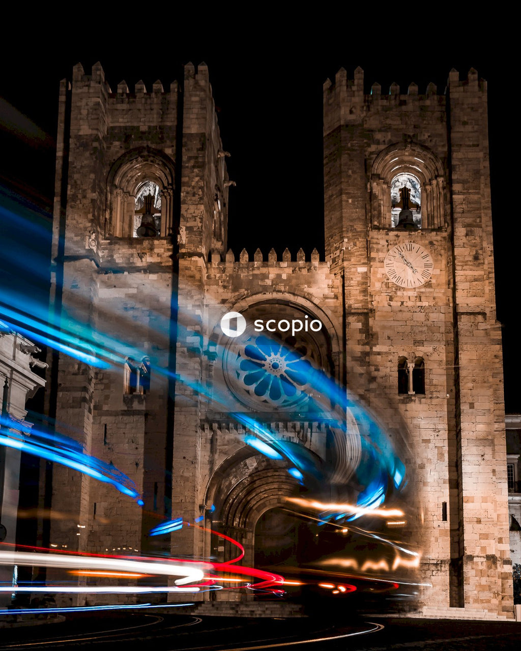 Time lapse photography of cars on road near building during night time