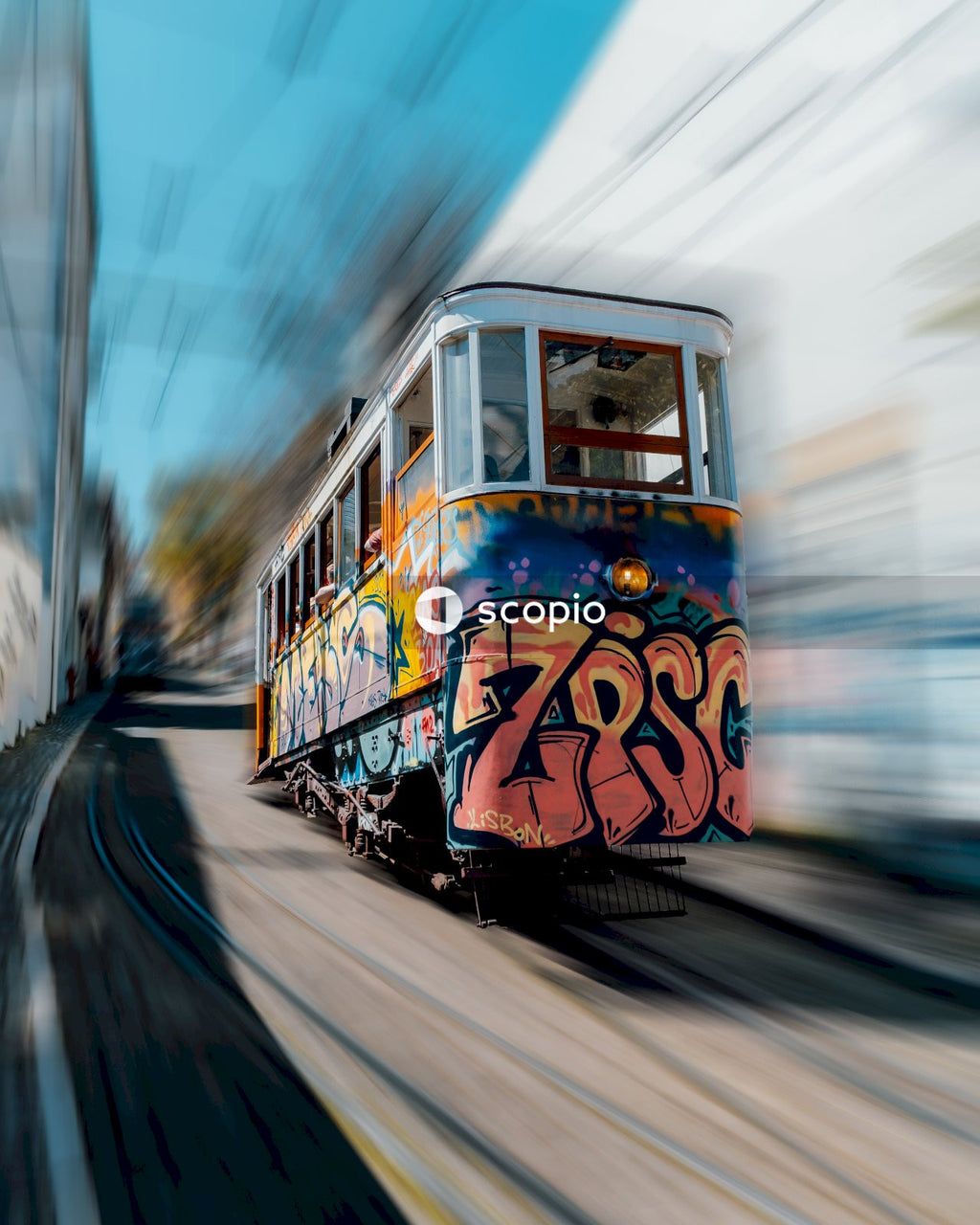 Train painted with graffiti on track