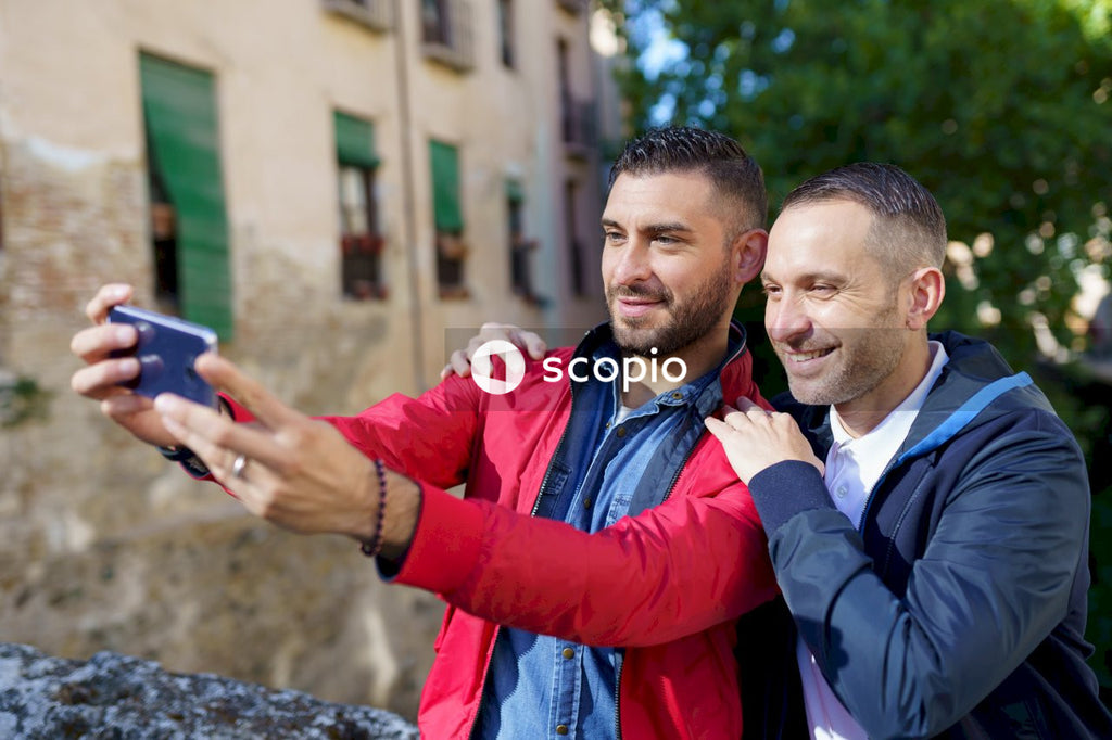 Two men taking selfie
