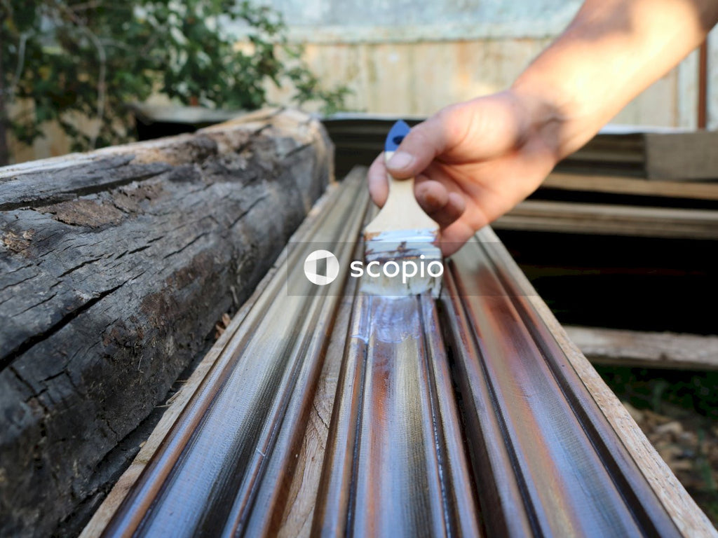 Varnishing the surface of dark wood panels