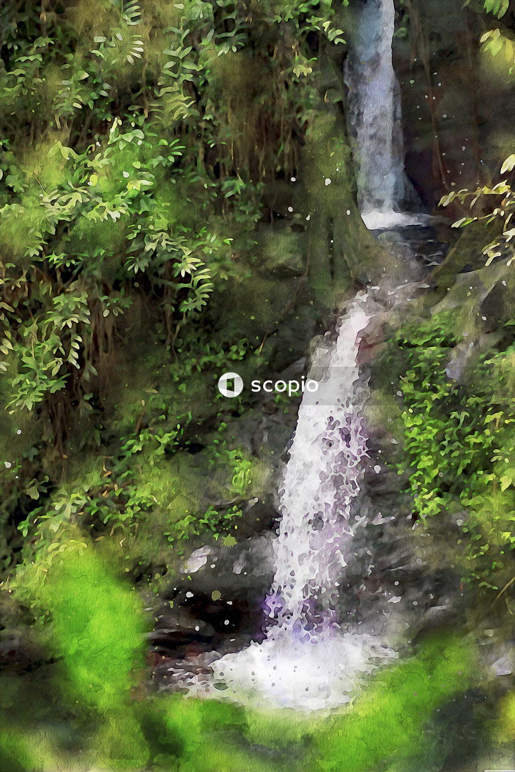 Water falls in the middle of green grass