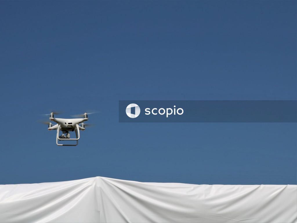 White and black drone on white textile