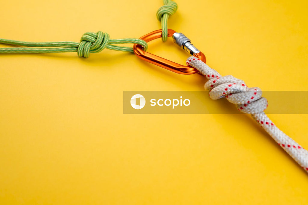 White and brown rope on yellow surface