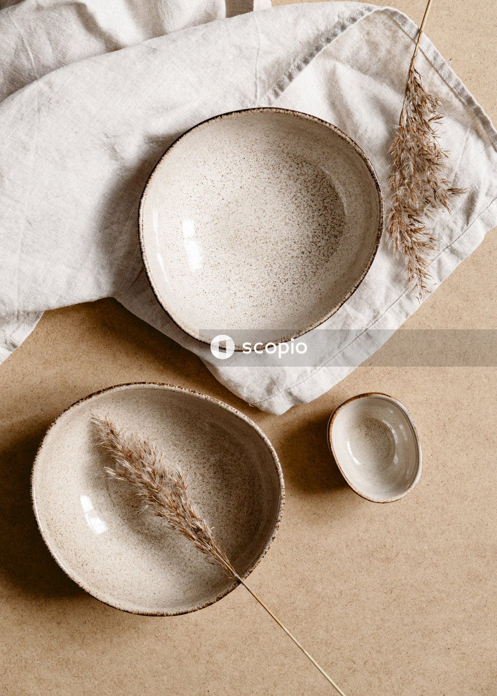 White ceramic bowl on white textile
