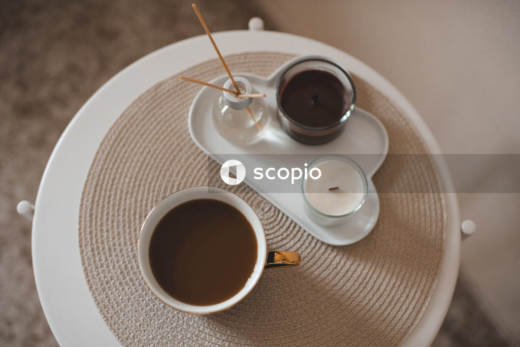 White ceramic cup on white ceramic saucer