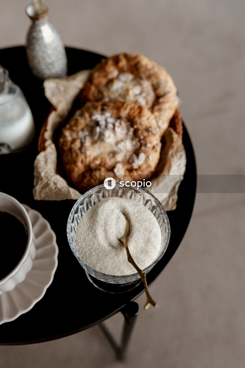 White ceramic mug with coffee on brown wooden table