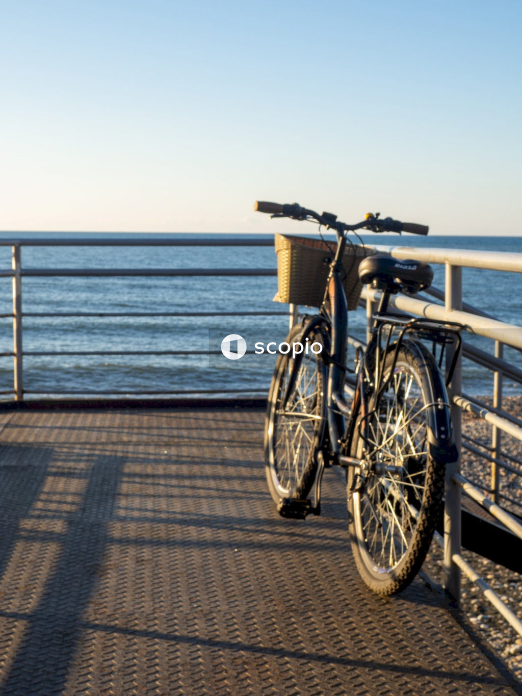 White city bike on wooden dock