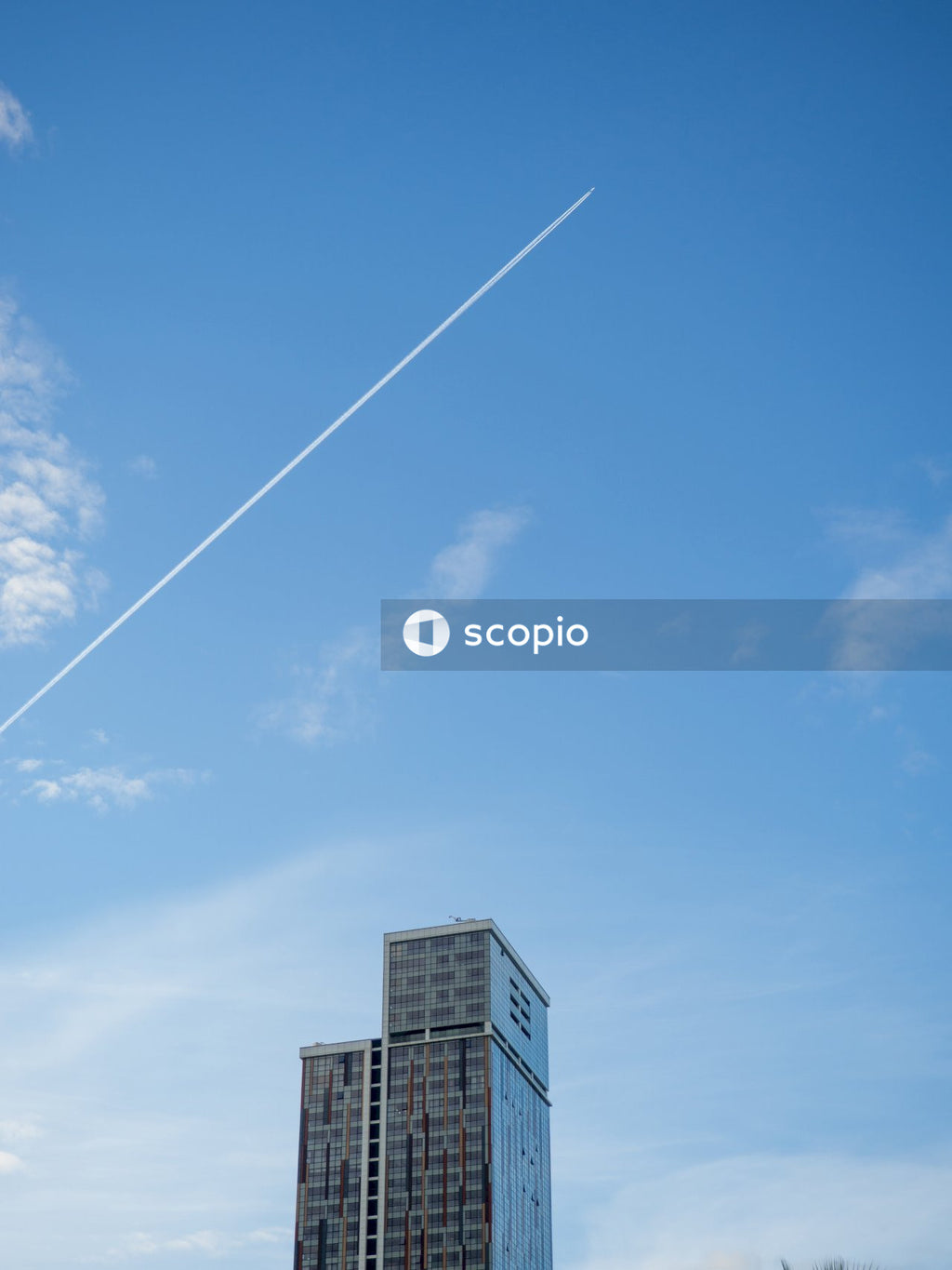 White clouds over city buildings
