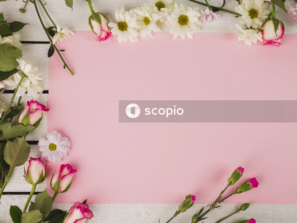 White pink and yellow floral textile