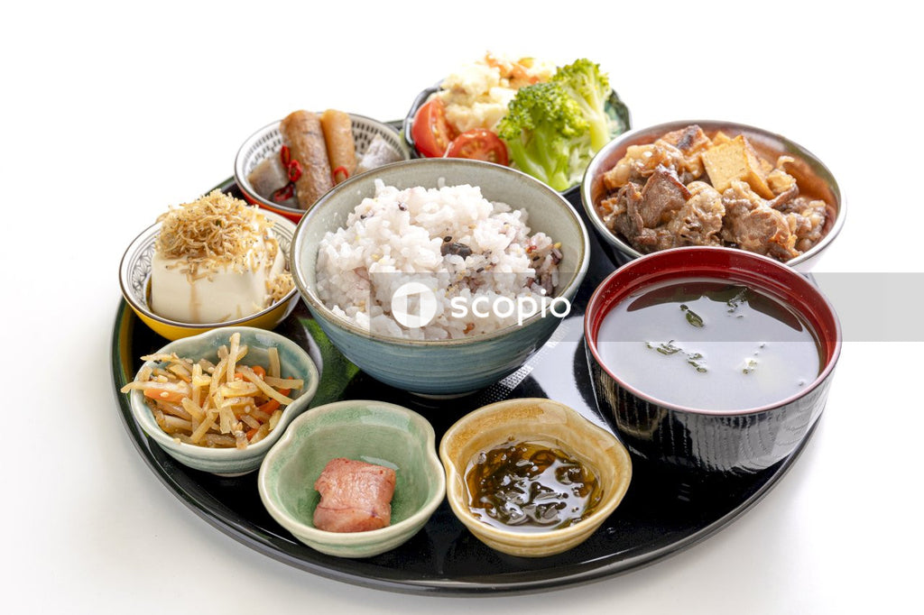 White rice with green vegetable and meat dish