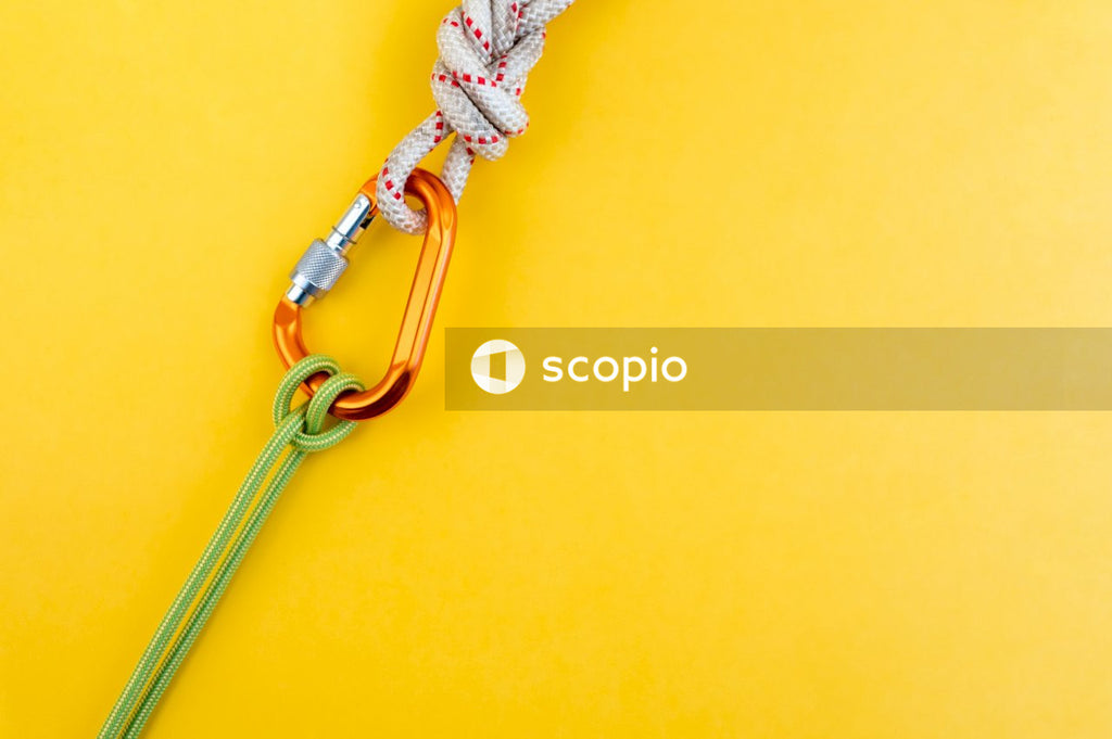White rope tied on brown metal hook