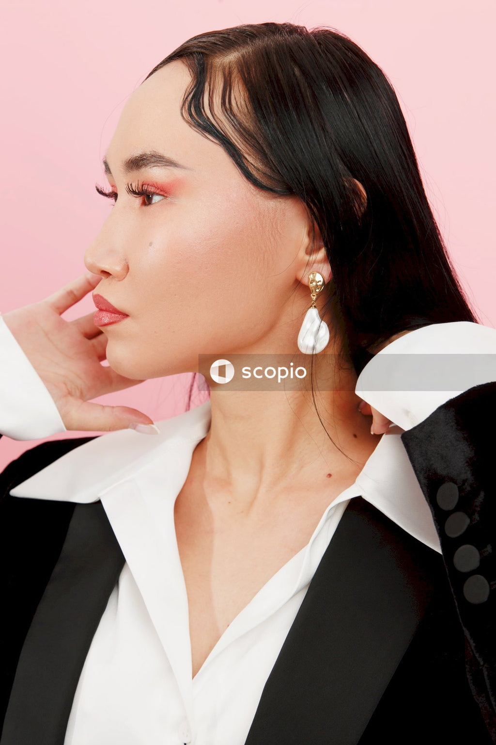 Woman in black and white collared shirt