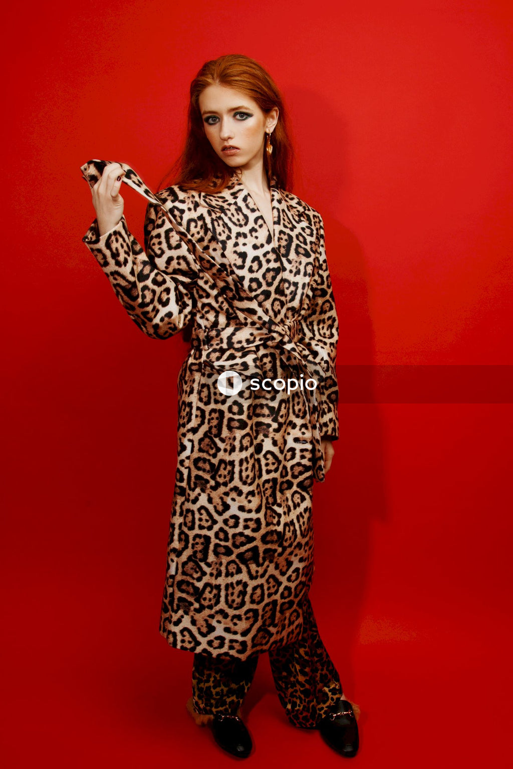 Woman in black and white floral long sleeve dress