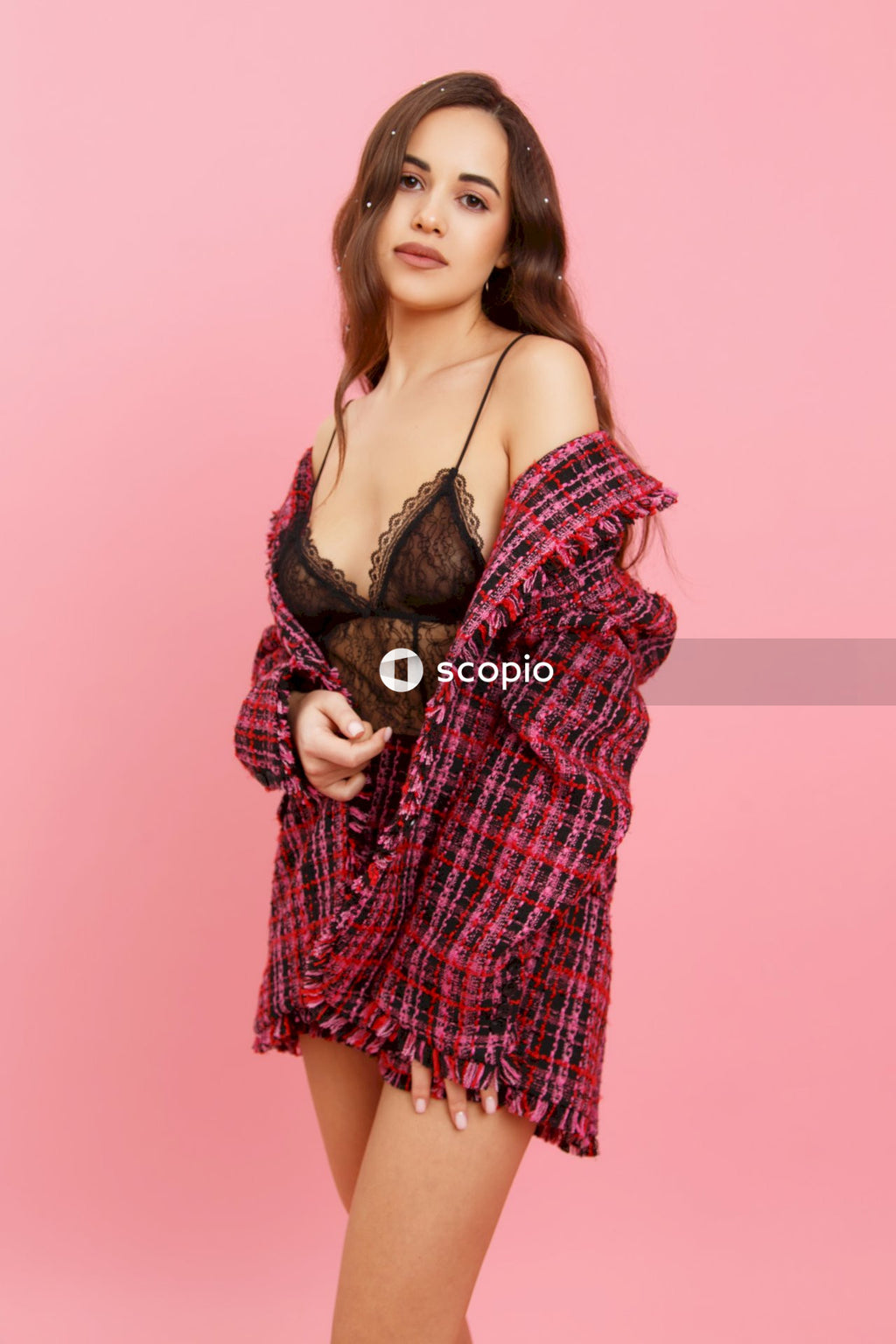 Woman in black and white plaid long sleeve shirt