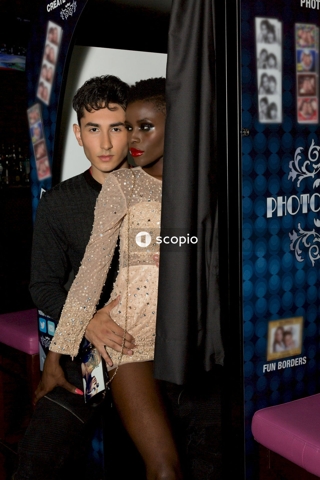 Man and woman in photo booth