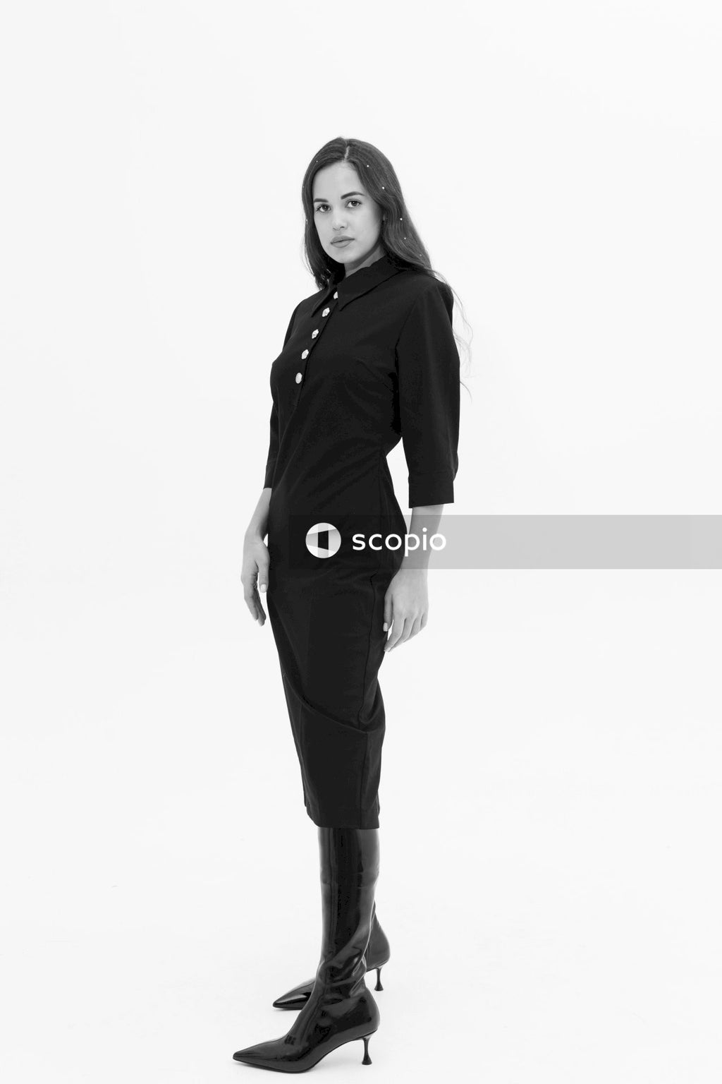 Woman in black jacket and pants