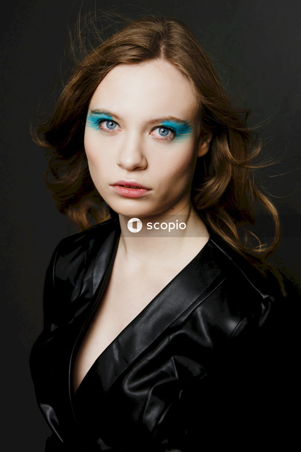 Woman in black leather jacket