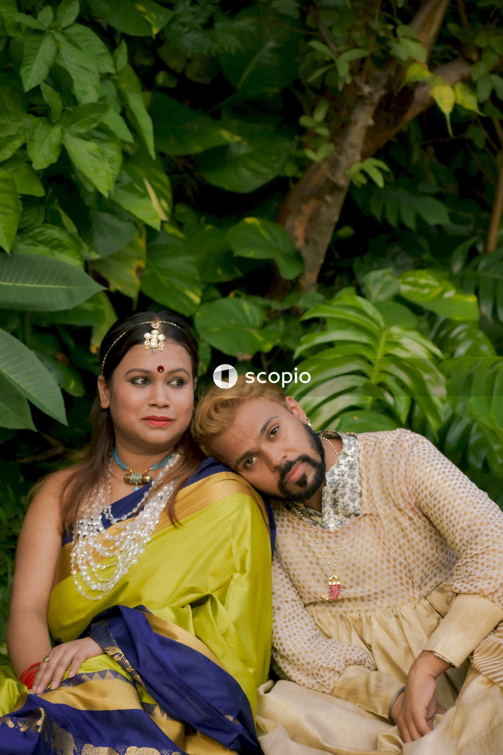 Man leaning on woman's shoulder outdoor