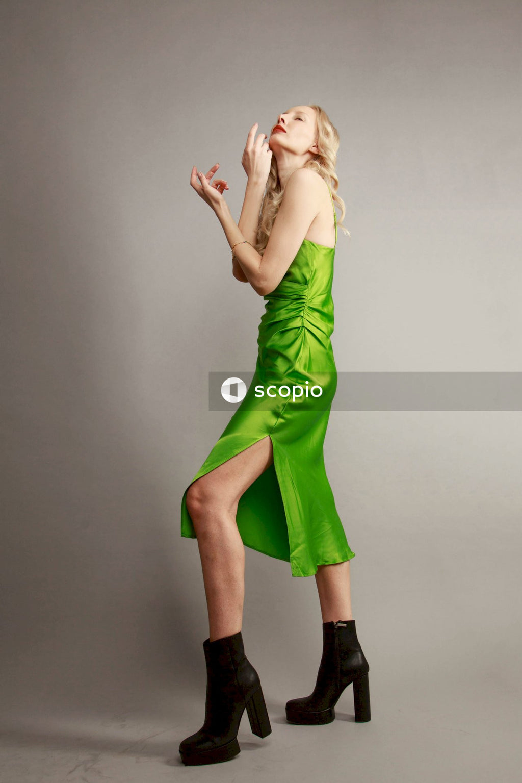 Woman in green tube dress