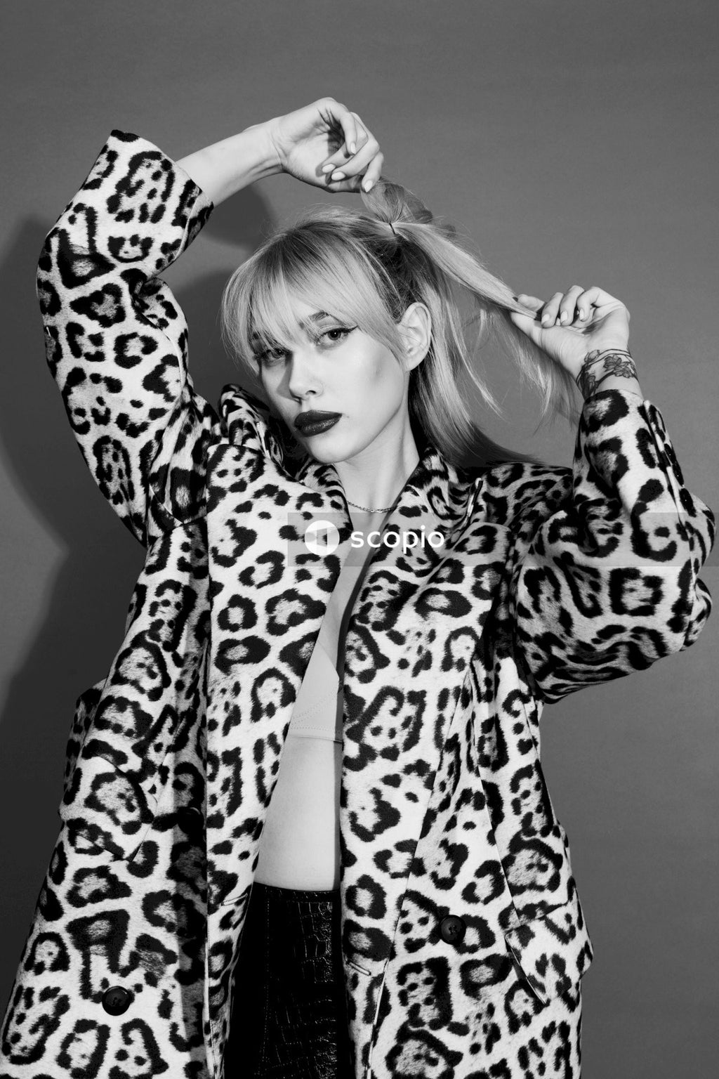 Woman in leopard print coat